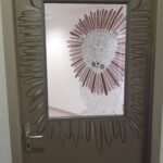 porte de la chambre lion